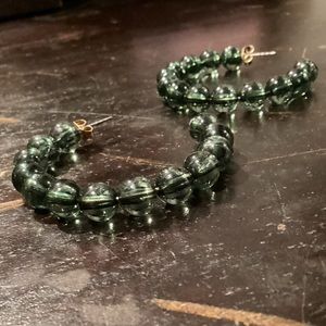Vintage dark green glass bead hops